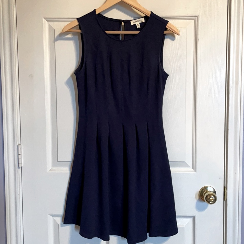Navy fit and flare dress. Very flattering!